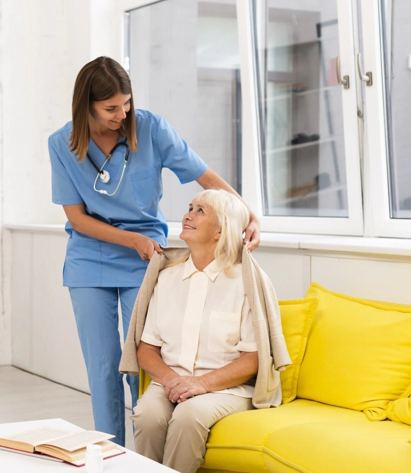 A Nursy Mates caregiver visiting an elderly client at home