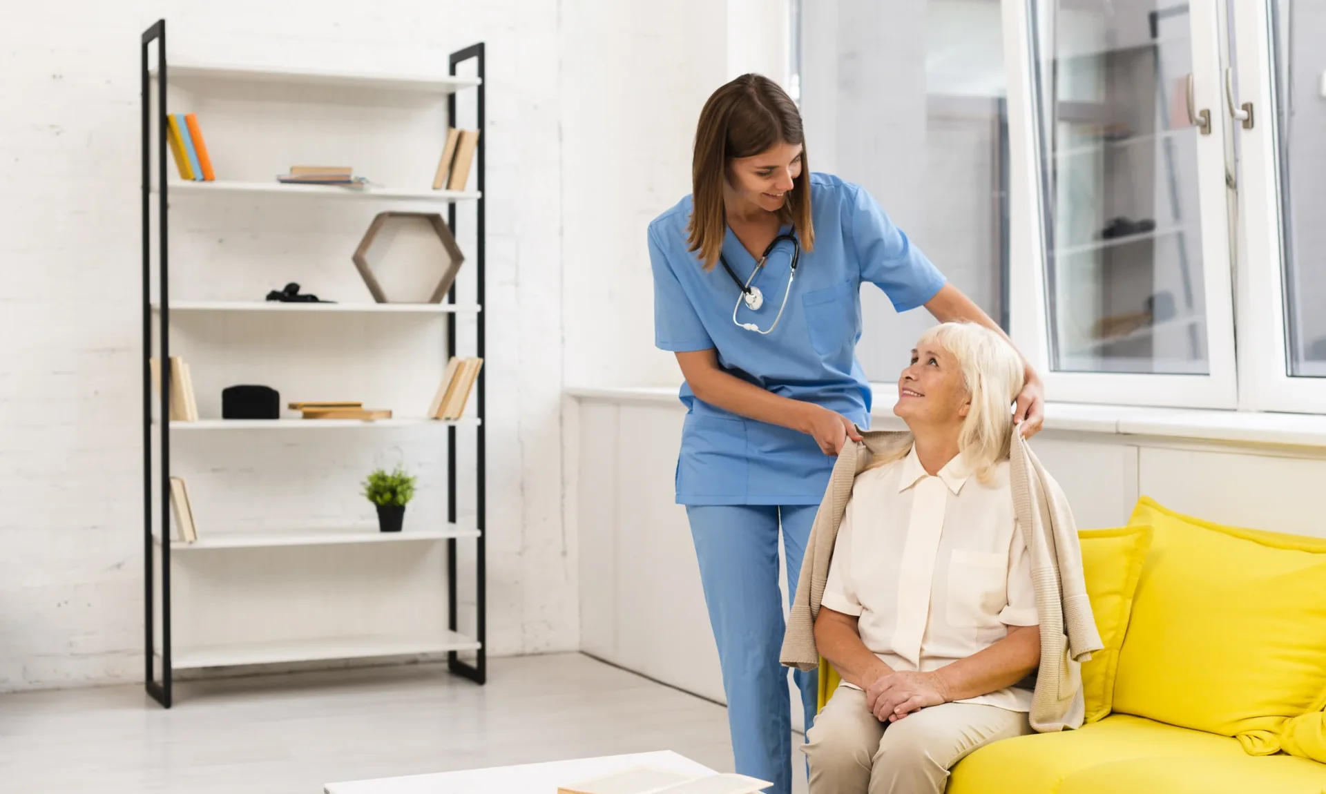 Caregiver helping a client at home